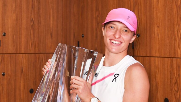 Iga Swiatek holds the Indain Wells trophy in the locker. She remains in the top spot of the WTA Power Rankings.