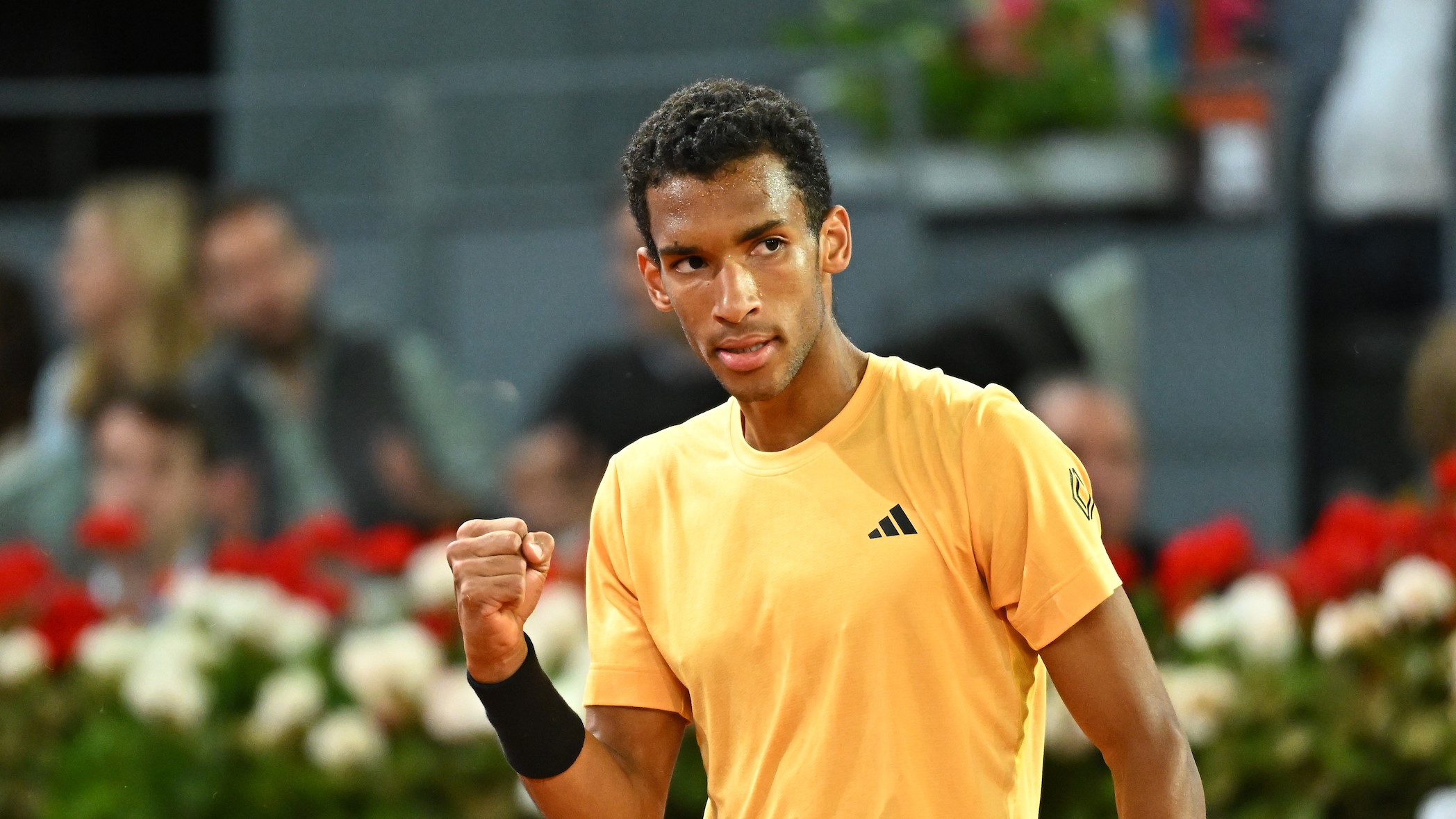 Felix Auger-Aliassime pumps his fist during the Madrid final. He is competing next in Rome.