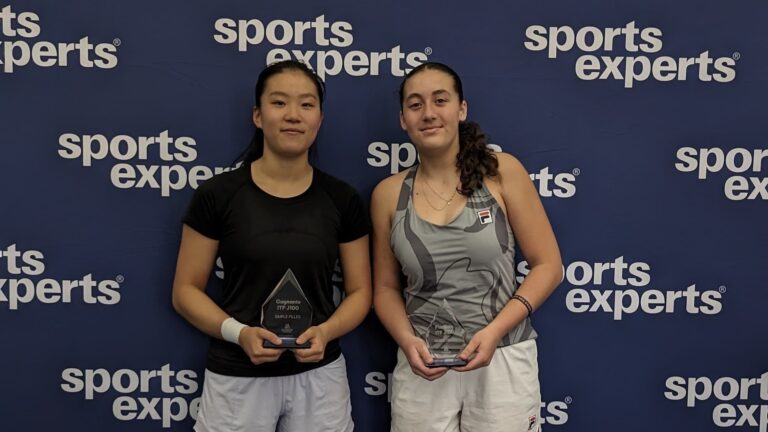 Emma Dong (left) and Andrea Taylor hold their trophies at the ITF junior event in Quebec City. Dong and Nicolas Arseneault each won multiple singles titles over the last month.